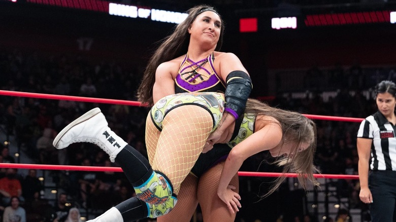 Rachael Ellering effortlessly gutwrenches opponent