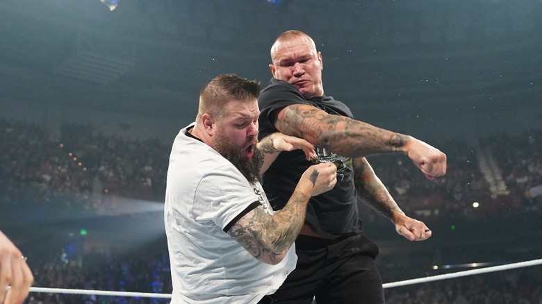 Randy Orton punches Kevin Owens during Smackdown at Bon Secours Wellness Arena on October 11, 2024 in Greenville, South Carolina.