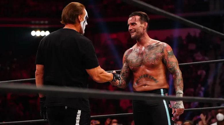 Punk Sting shake hands