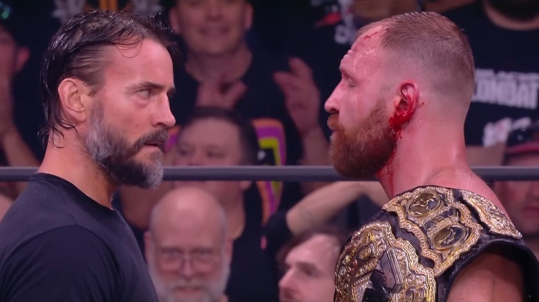 CM Punk Jon Moxley faceoff