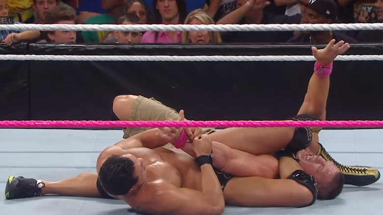 Alberto Del Rio grappling John Cena