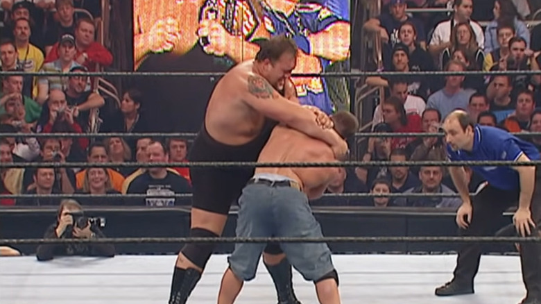 Big Show grappling John Cena at WrestleMania XX