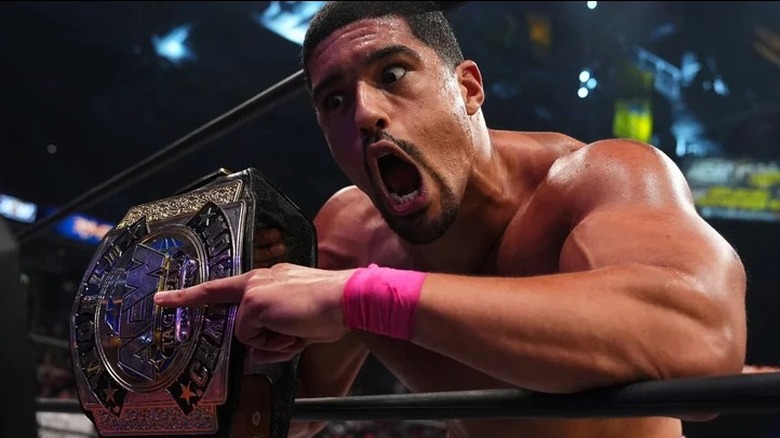 Anthony Bowens poses with his AEW title