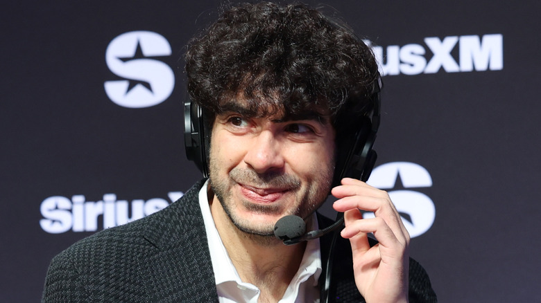 Tony Khan on a headset