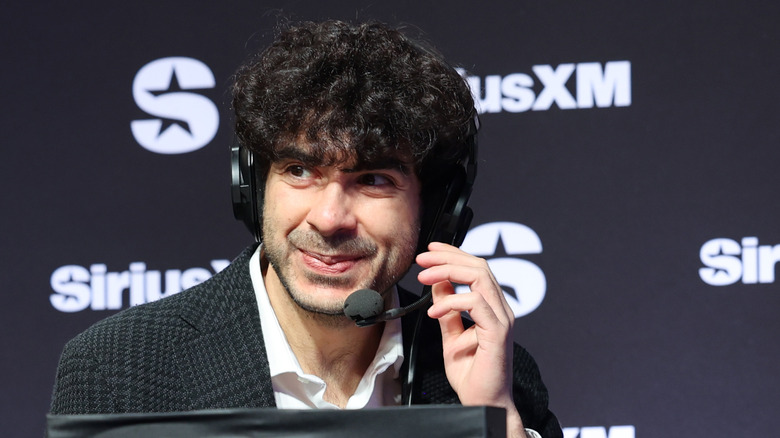 Tony Khan on a headset