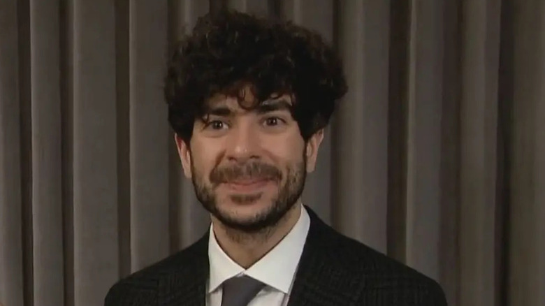 AEW CEO Tony Khan smiling