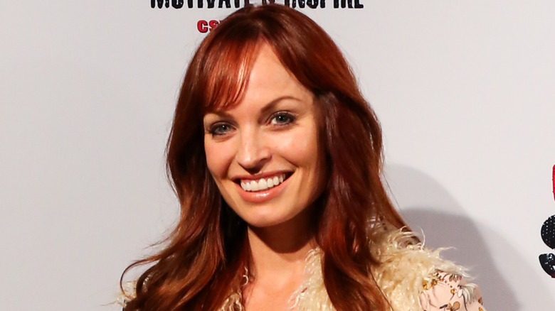 Christy Hemme smiles on the red carpet