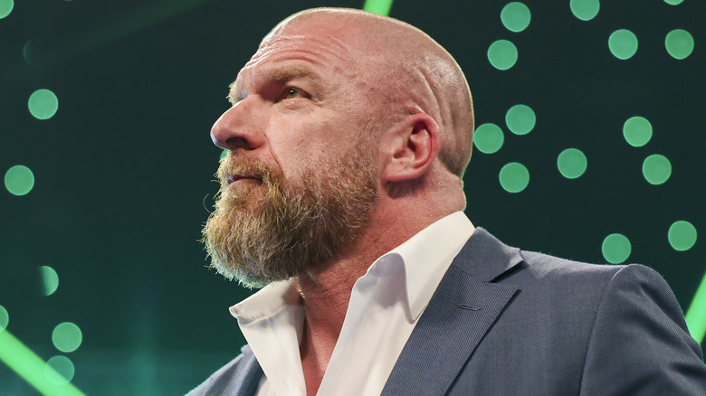 Triple H with green lighting