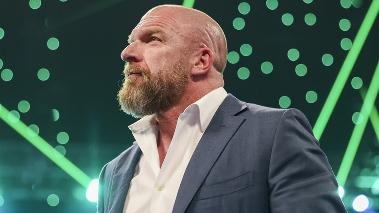 Triple H with green lighting
