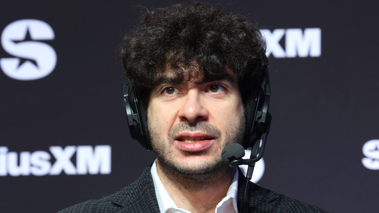 Tony Khan on a headset