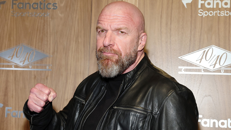 Triple H wearing a black leather jacket