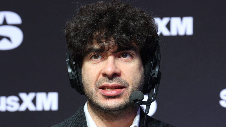 Tony Khan wearing a headset