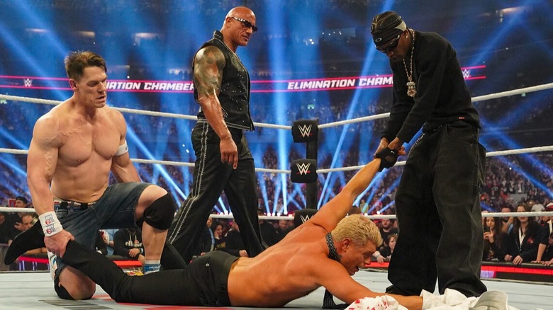 The Rock, John Cena, and rapper Travis Scott all brutalize Cody Rhodes after the 