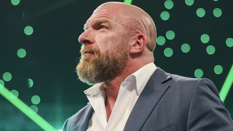 Triple H with green lighting