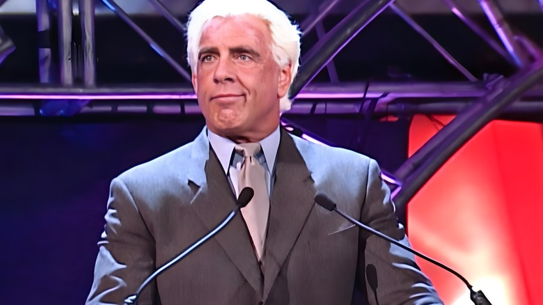 Ric Flair wearing a gray suit