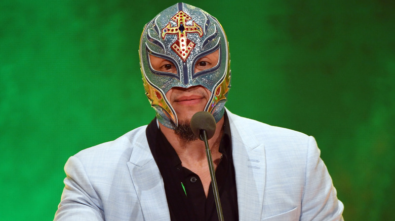 Rey Mysterio talking into a micriphone