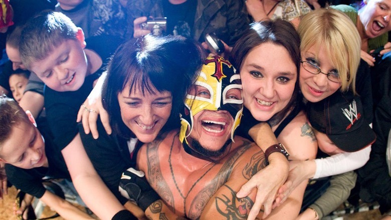 Rey Mysterio Embraces Fans At A WWE Live Event