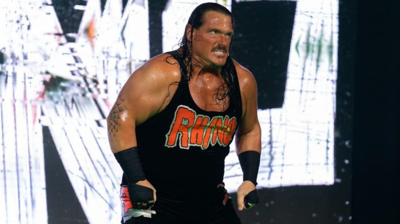 Rhyno wearing a black singlet