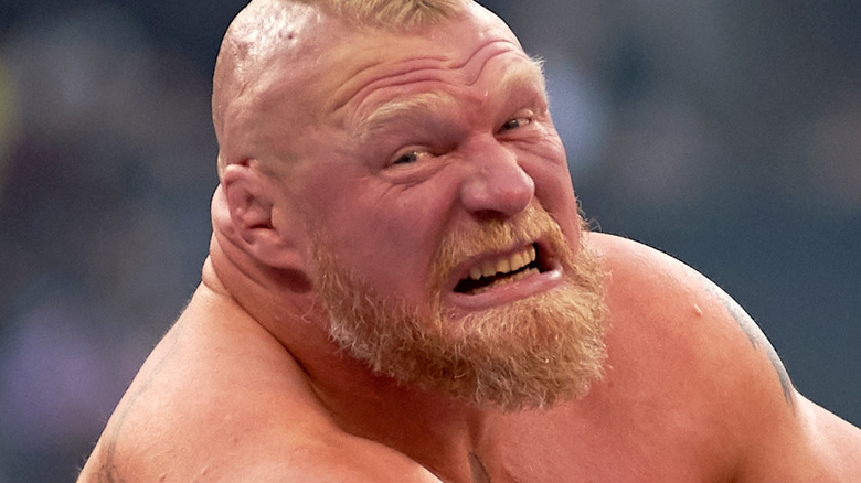 Brock Lesnar struggles in a bearhug