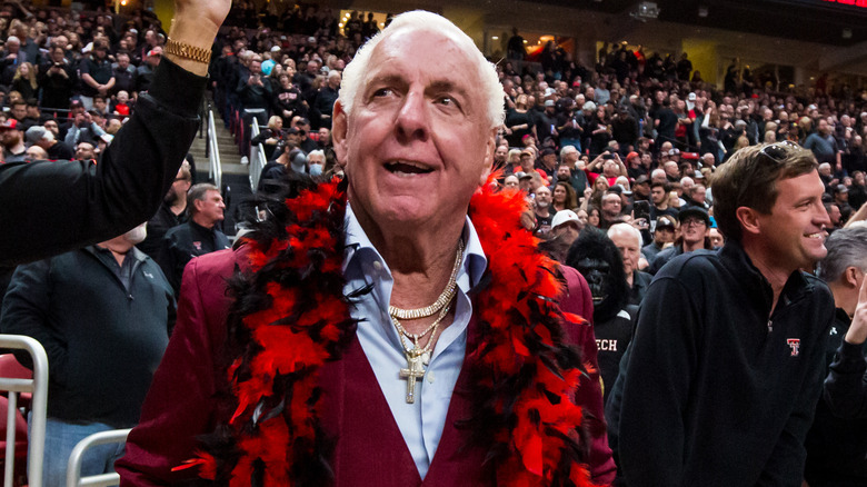 Ric Flair wearing a red feather boa