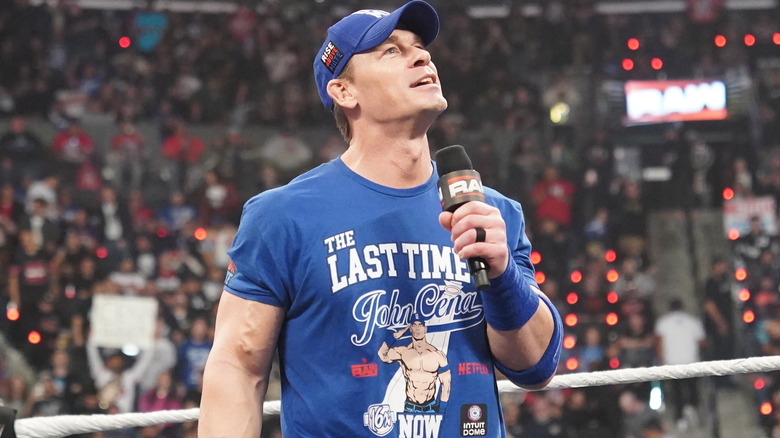 John Cena holding a microphone