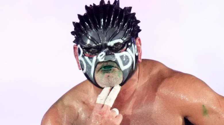 The Great Muta summoning his trademark mist