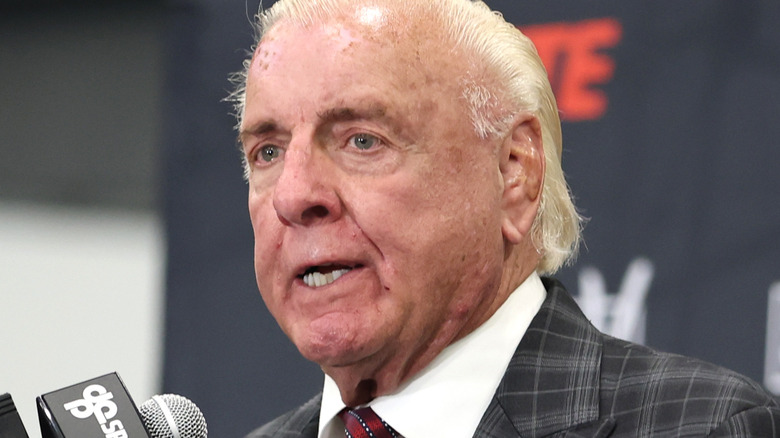 Ric Flair talking into a mic