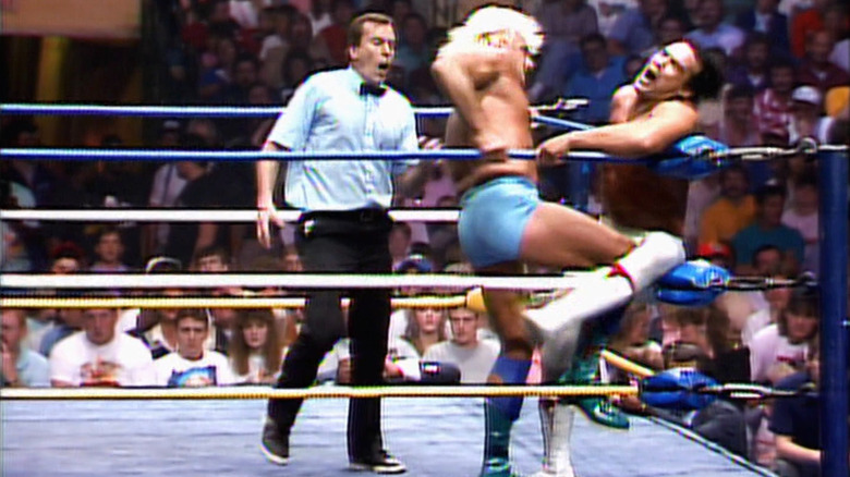 Ric Flair kneeing Ricky Steamboat
