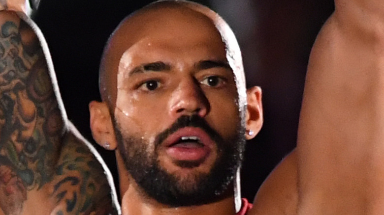 Ricochet poses at a WWE Live Event in 2019