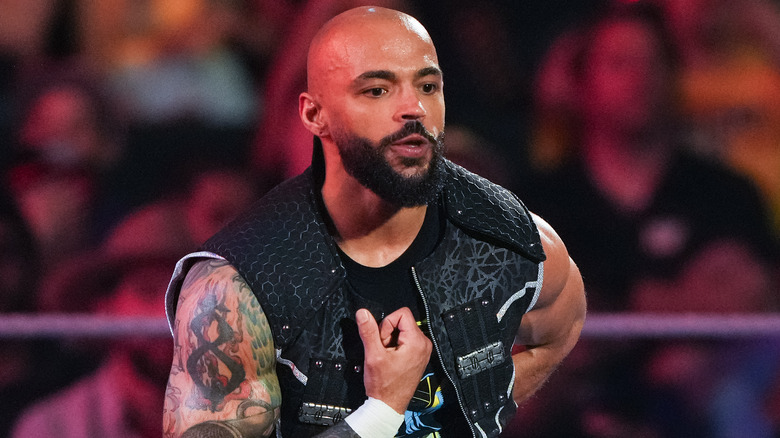 Ricochet wearing a sleeveless jacket