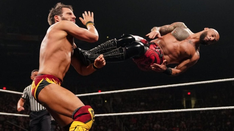 Ricochet dropkicks Johnny Gargano