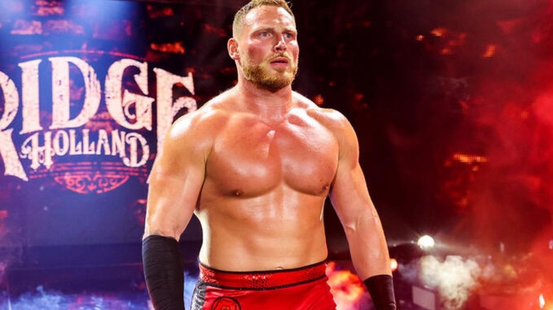 Ridge Holland stands on the stage and stares toward the ring before a match on "WWE NXT."