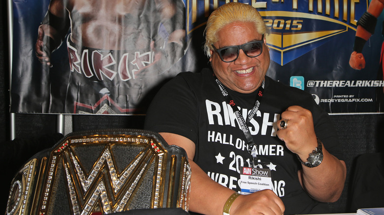 Rikishi posing for photo at an event