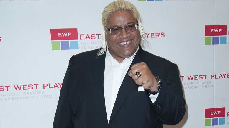 Rikishi smiling