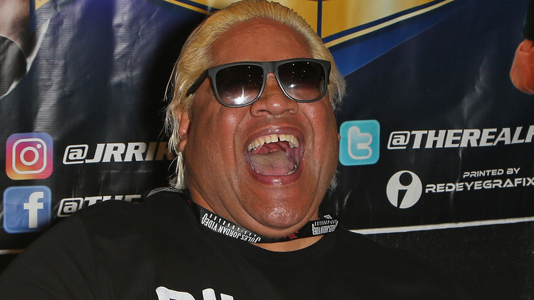 Rikishi laughs to conceal the pain of Jey Uso losing Money in the Bank