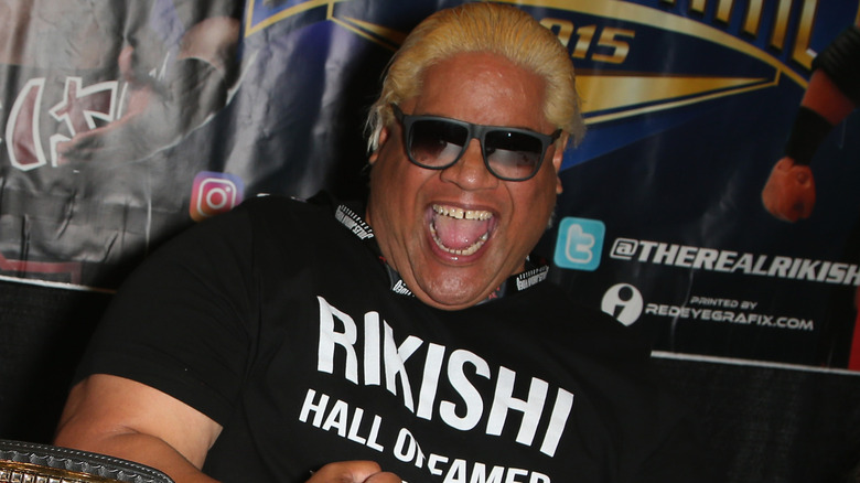 Rikishi laughing