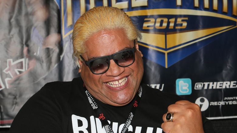 Rikishi smiling