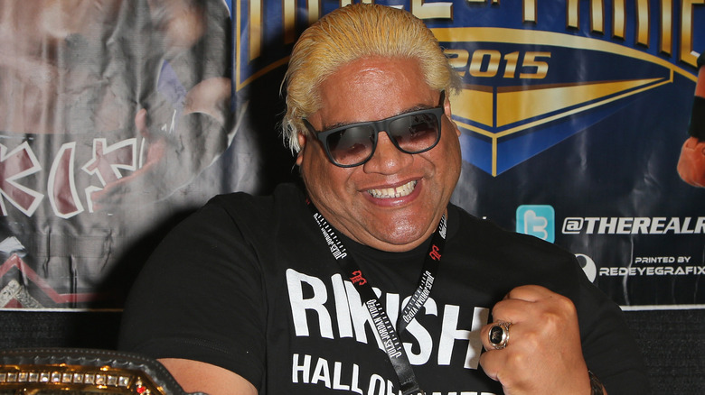 Rikishi smiling