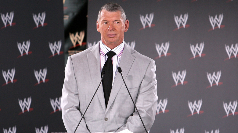 Vince McMahon speaking at a press conference