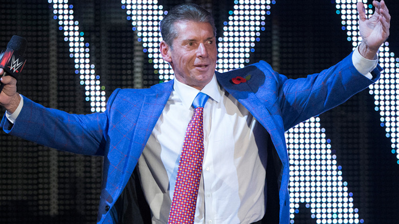 Vince McMahon arms outstretched