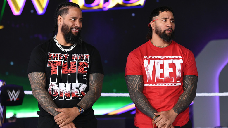 Jimmy and Jey Uso standing beside one another