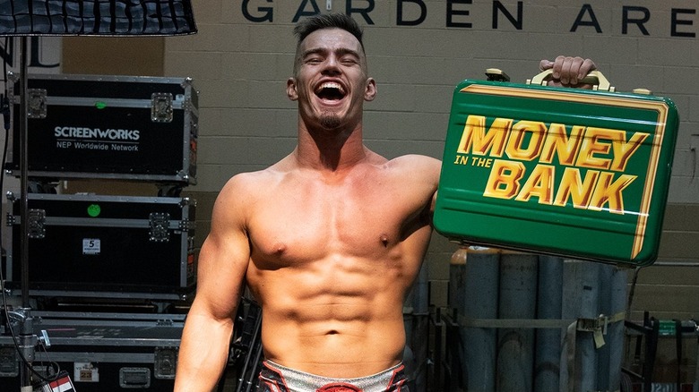 Austin Theory with Money in the Bank briefcase