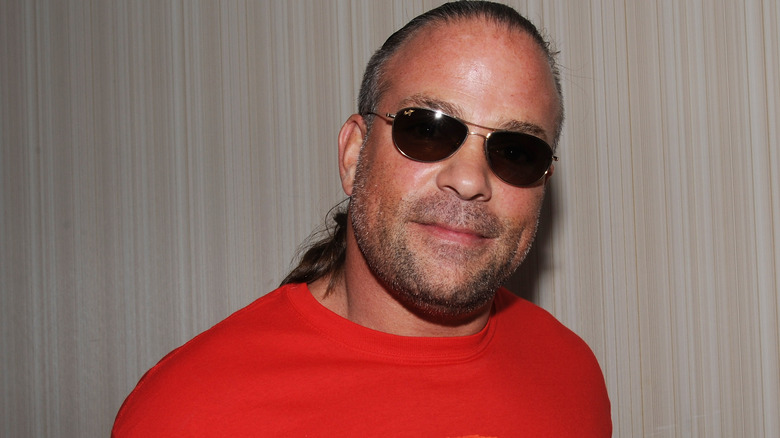 Rob Van Dam wearing sunglasses and smiling