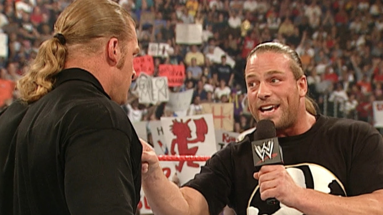 Rob Van Dam talking to Triple H