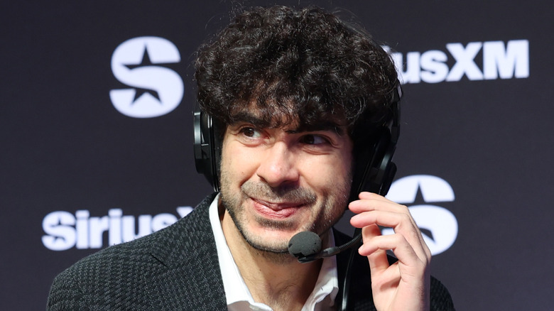 Tony Khan on a headset