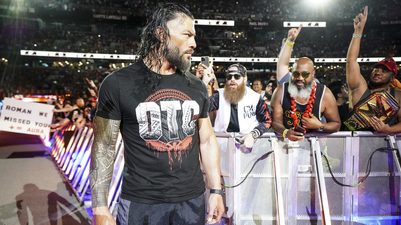 Roman Reigns stares down the aisle