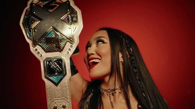 'NXT' Women's Champion Roxanne Perez looks at title belt