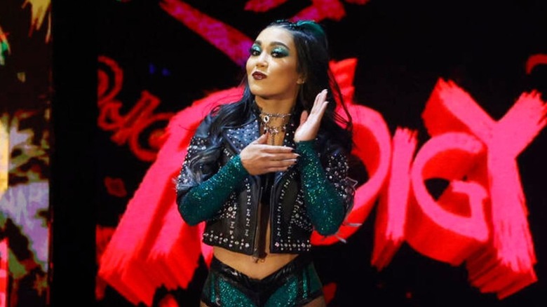 Roxanne Perez makes her entrance down the ramp before a match on 