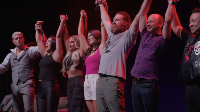 Sami Zayn onstage with crew after comedy event in Toronto