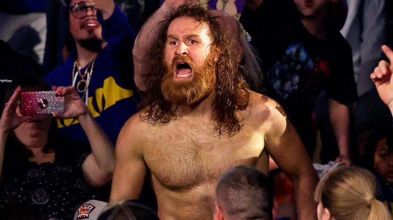 Sami Zayn in the crowd at a WWE event